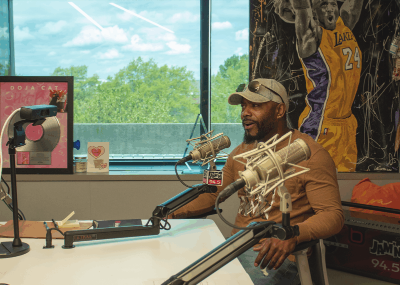 Francisco speaking into the mic during his iHeart interview
